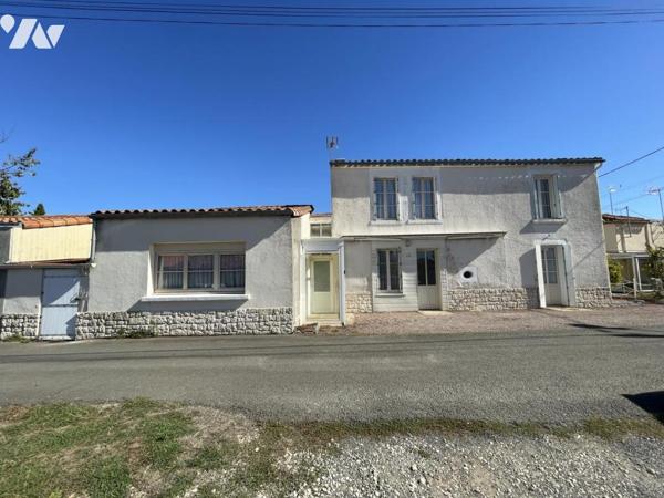 Maison d'habitation en centre ville avec dépendance et terrain non attenant.
