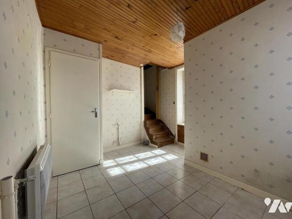 Maison d'habitation en centre ville avec dépendance et terrain non attenant.