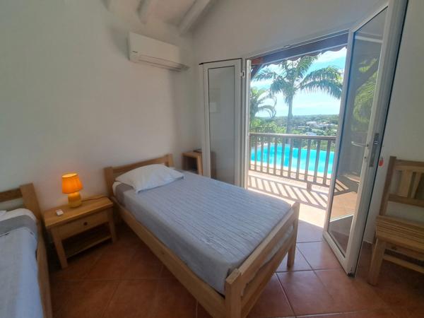 Propriété d’exception à la vue mer panoramique – Élégance créole et art de vivre tropical