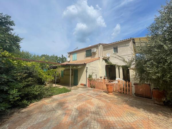 MAISON COMPOSEE DE DEUX LOGEMENTS SUR TERRAIN DE 2162M2