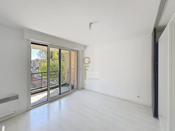 T3 DE 75M2 : 2 CHAMBRES, TERRASSE DE 20M2 ET PARKING