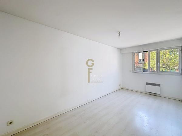 T3 DE 75M2 : 2 CHAMBRES, TERRASSE DE 20M2 ET PARKING