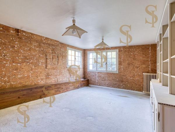 Maison familiale de 263m² avec grand jardin arboré