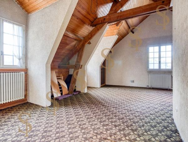 Maison familiale de 263m² avec grand jardin arboré