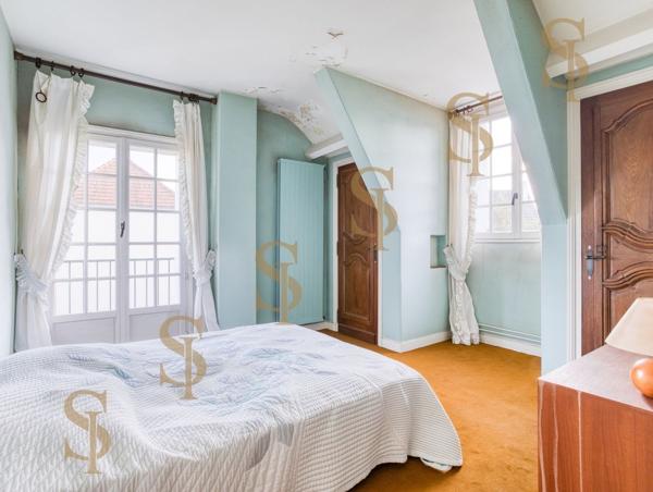 Maison familiale de 263m² avec grand jardin arboré