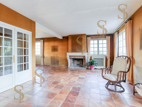 Maison familiale de 263m² avec grand jardin arboré
