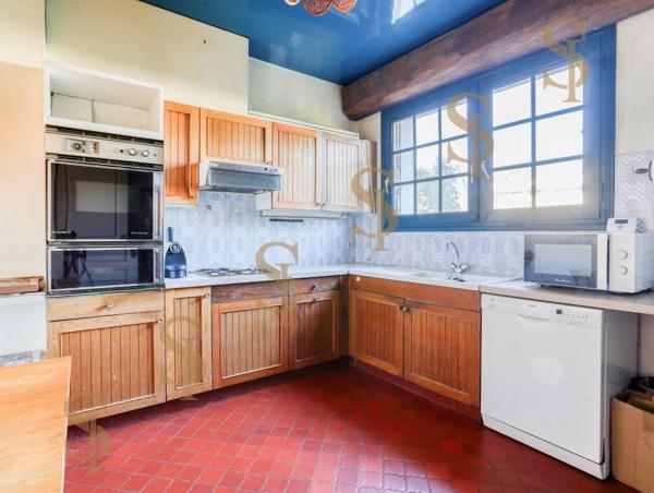 Maison familiale de 263m² avec grand jardin arboré