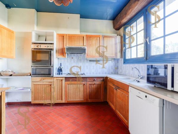Maison familiale de 263m² avec grand jardin arboré