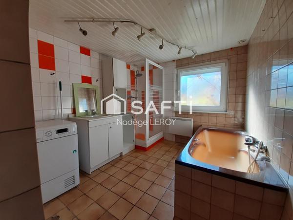 Maison 4 chambres et deux garages