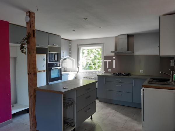 Maison 4 chambres et deux garages