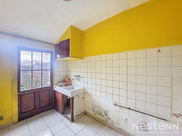 A Vendre Maison de ville en pierre à rénover avec cour intérieure au centre de Condom