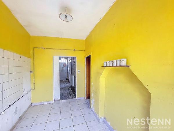 A Vendre Maison de ville en pierre à rénover avec cour intérieure au centre de Condom