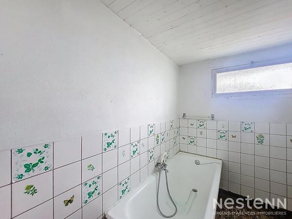 A Vendre Maison de ville en pierre à rénover avec cour intérieure au centre de Condom