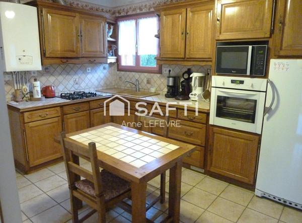 Propriété avec maison d'habitation et dépendances