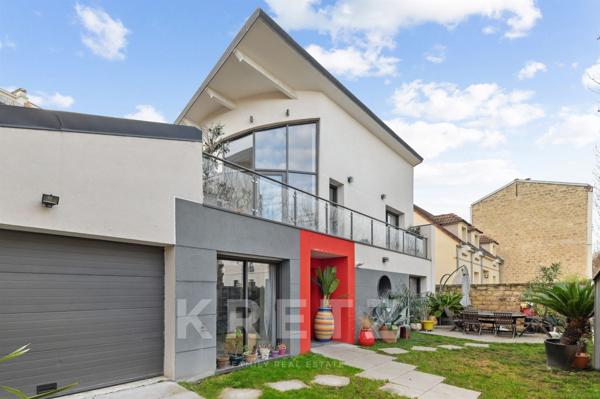 Maison contemporaine avec terrasses et patio