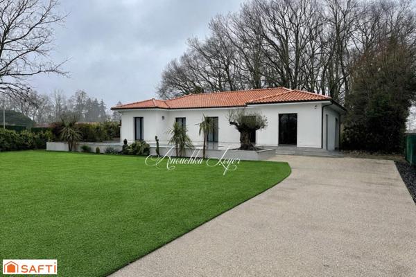 Maison avec garage et piscine au calme