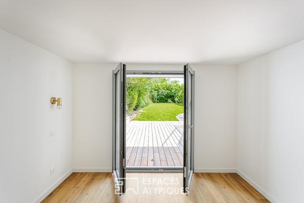 Charmante maison inversée des années 60 à la rénovation de qualité