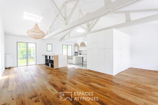 Charmante maison inversée des années 60 à la rénovation de qualité