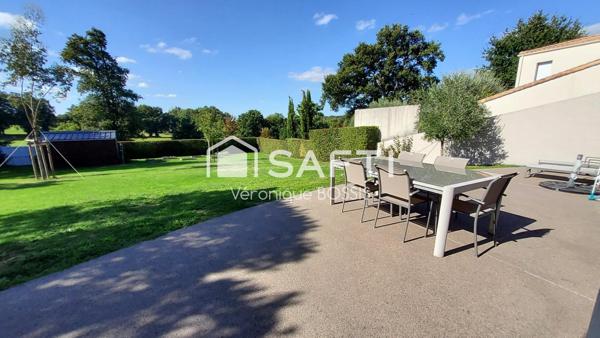 Plain pied alliant qualité, confort et vue sur le golf de la Domangère