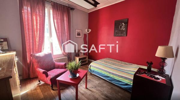 Duplex à fort potentiel avec jardin