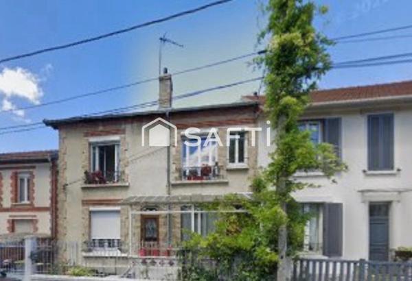 Duplex à fort potentiel avec jardin