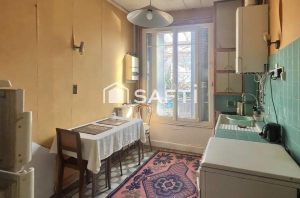 Duplex à fort potentiel avec jardin