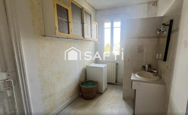 Duplex à fort potentiel avec jardin