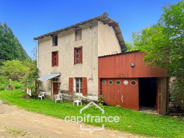 Maison en pierre avec garage et terrain à rénover entièrement- Saint Rémy sur Durolle