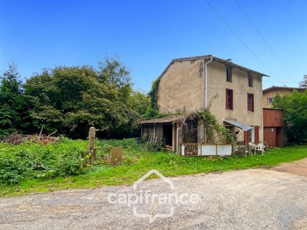 Maison en pierre avec garage et terrain à rénover entièrement- Saint Rémy sur Durolle