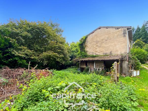 Maison en pierre avec garage et terrain à rénover entièrement- Saint Rémy sur Durolle