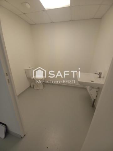 Local commercial avec revenu locatif – Opportunité d'investissement