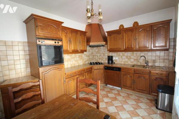 Maison de 3pièces et plus , avec combles aménagées et garage buanderie dans quartier calme