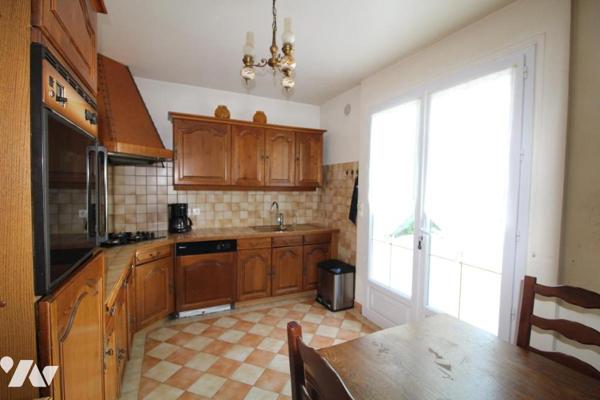 Maison de 3pièces et plus , avec combles aménagées et garage buanderie dans quartier calme