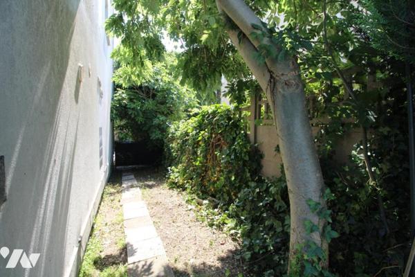 Maison de 3pièces et plus , avec combles aménagées et garage buanderie dans quartier calme