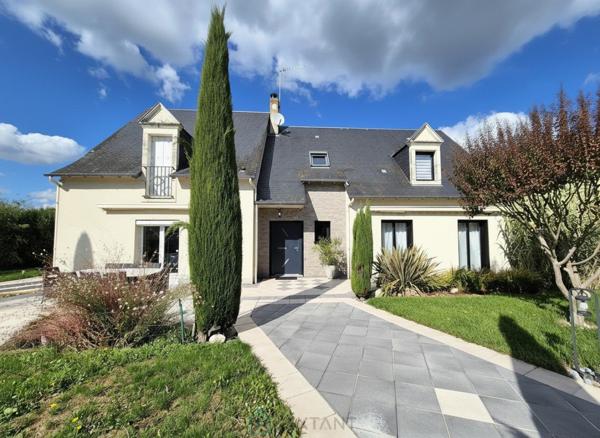 Belles prestations : Maison 5 chambres, garage, piscine, jardin paysagé