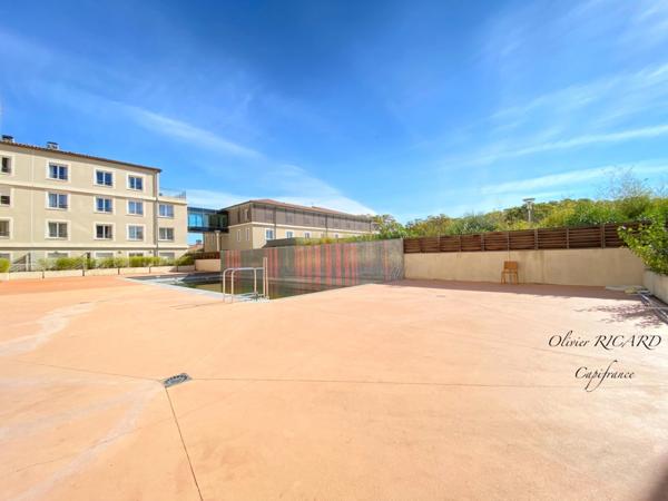 Dpt Hérault (34), à vendre JUVIGNAC Appartement T3 de 66,89 m2 dans résidence avec piscine