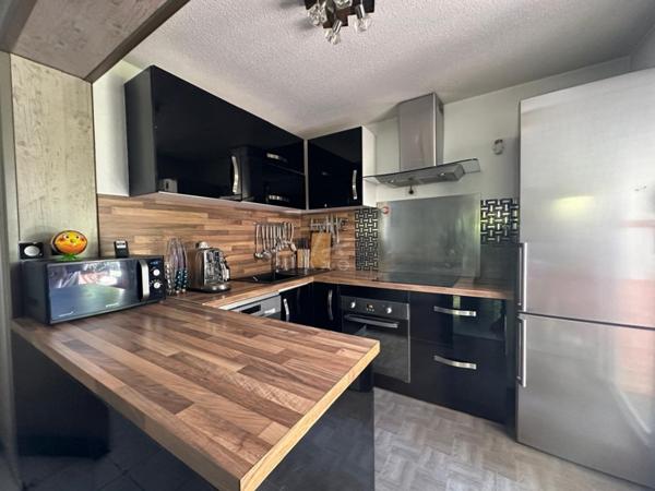 Découvrez ce charmant T3 à Toulouse dans une résidence arborée !