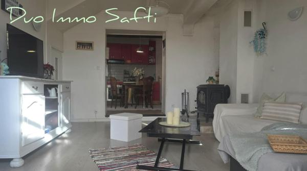 Maison 4 pièces avec véranda, caves, garage et stationnement.