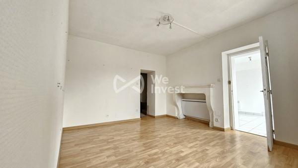 Immeuble, un local commercial et deux appartements