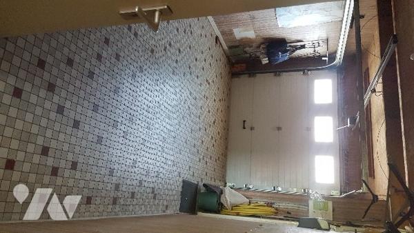 Maison mitoyenne comprenant 3 chambres, un garage et un sous-sol