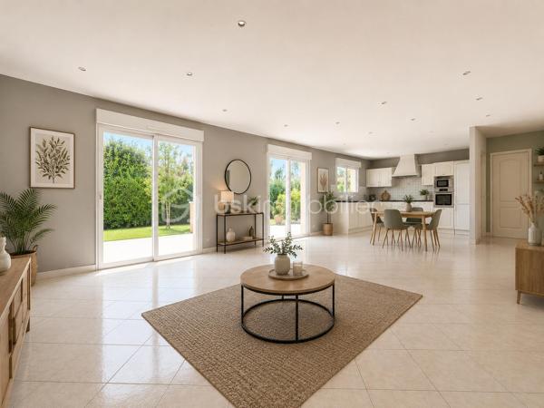 Venez découvrir cette belle maison de plain-pied, construite en 2006 par Claude Rizzon.
Idéalement conçue pour les personnes en quête de calme, de confort et d'un extérieur facile à entretenir, cette maison saura vous séduire par ses beaux volumes et sa fonctionnalité.
Dès l'entrée, vous découvrirez un hall qui dessert un WC indépendant, deux chambres ainsi qu'une vaste pièce de vie ouverte d'environ 55 m². Celle-ci communique directement avec un cellier et le garage, un véritable atout pour faciliter le quotidien, notamment au retour des courses.
Une salle de bain indépendante complète harmonieusement l'ensemble.
Vous avez un projet familial ou souhaitez vivre à proximité de vos proches ? C'est tout à fait possible ! Une seconde maison, située à l'arrière de la propriété, est également proposée à la vente. Une opportunité idéale pour accueillir un membre de votre famille ou choisir votre futur voisin.
N'hésitez pas à me contacter pour organiser une visite. Cette maison n'attend plus que vous !