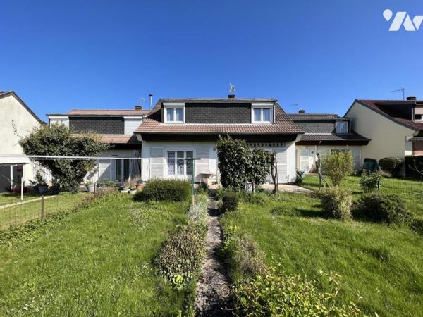 Maison d'habitation mitoyenne