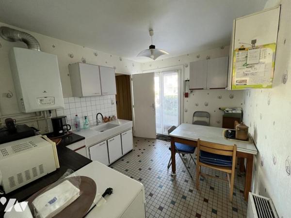 Maison d'habitation mitoyenne