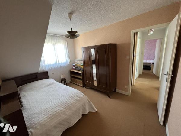 Maison d'habitation mitoyenne