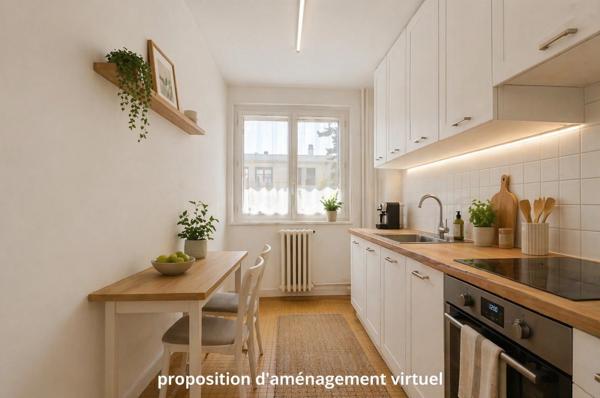 3 PIECES - 61,38 m² - BALCON, CAVE ET BOX - RESIDENCE EN PIERRE DE TAILLE