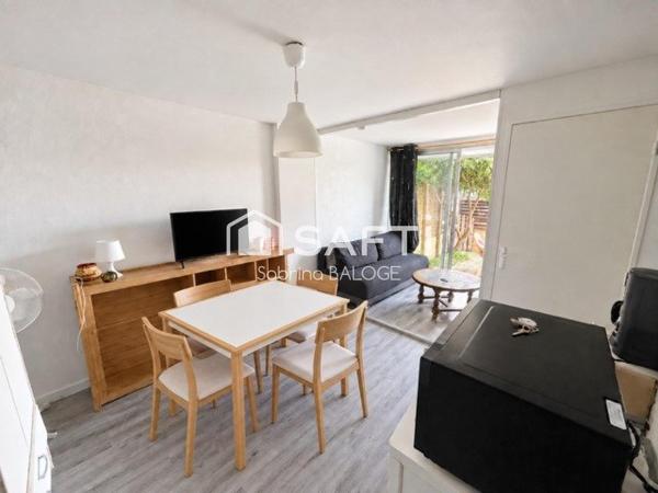 Appartement en rez-de-jardin avec belle terrasse