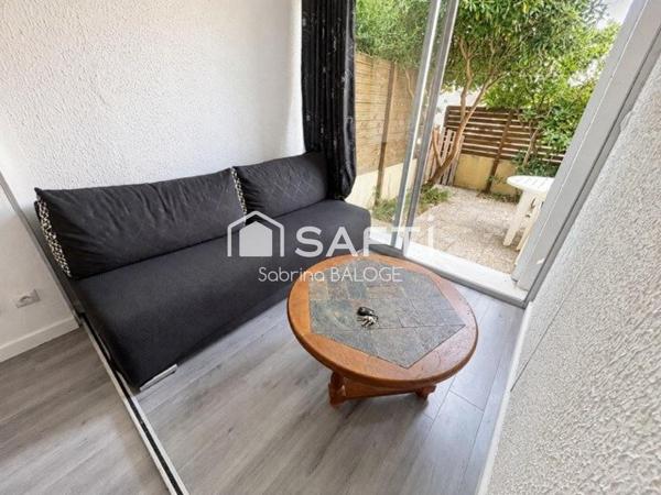 Appartement en rez-de-jardin avec belle terrasse