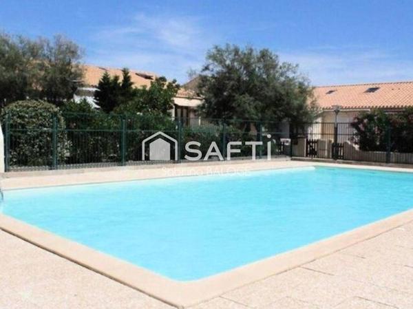 Appartement en rez-de-jardin avec belle terrasse