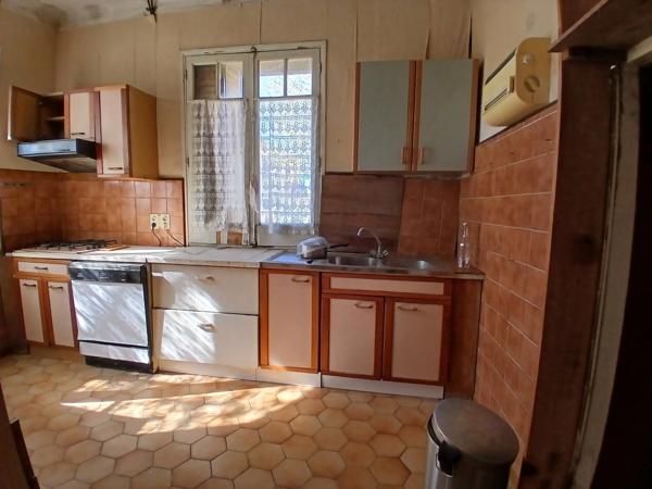 Maison à fort potentiel sur terrain constructible  – Opportunité rare à rénover