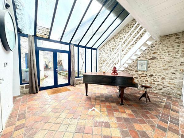 Maison familiale avec espace professionnel possible en Centre-ville de Linas